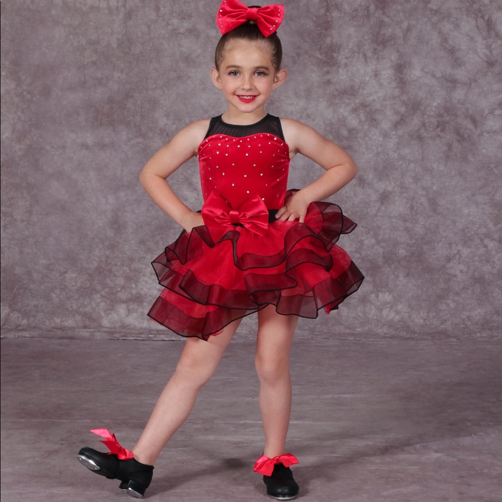 Red velvet costume with rhinestones. Includes hair bow and shoe bows. Worn once